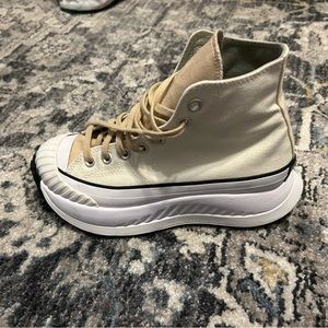 Beige/green/tan converse traction utility shoes